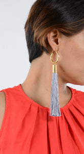 Silver statement necklace with bold geometric design.